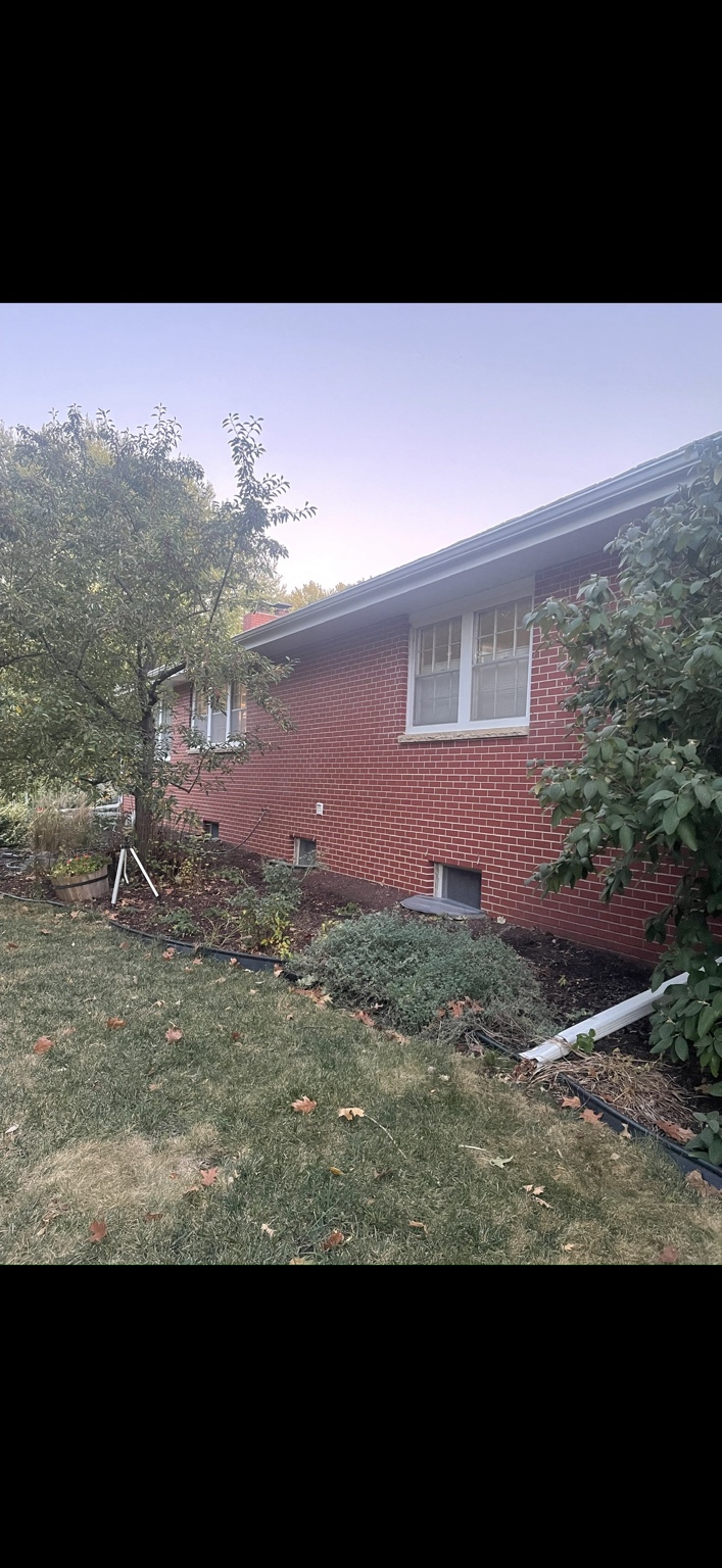 Red brick exterior before painting