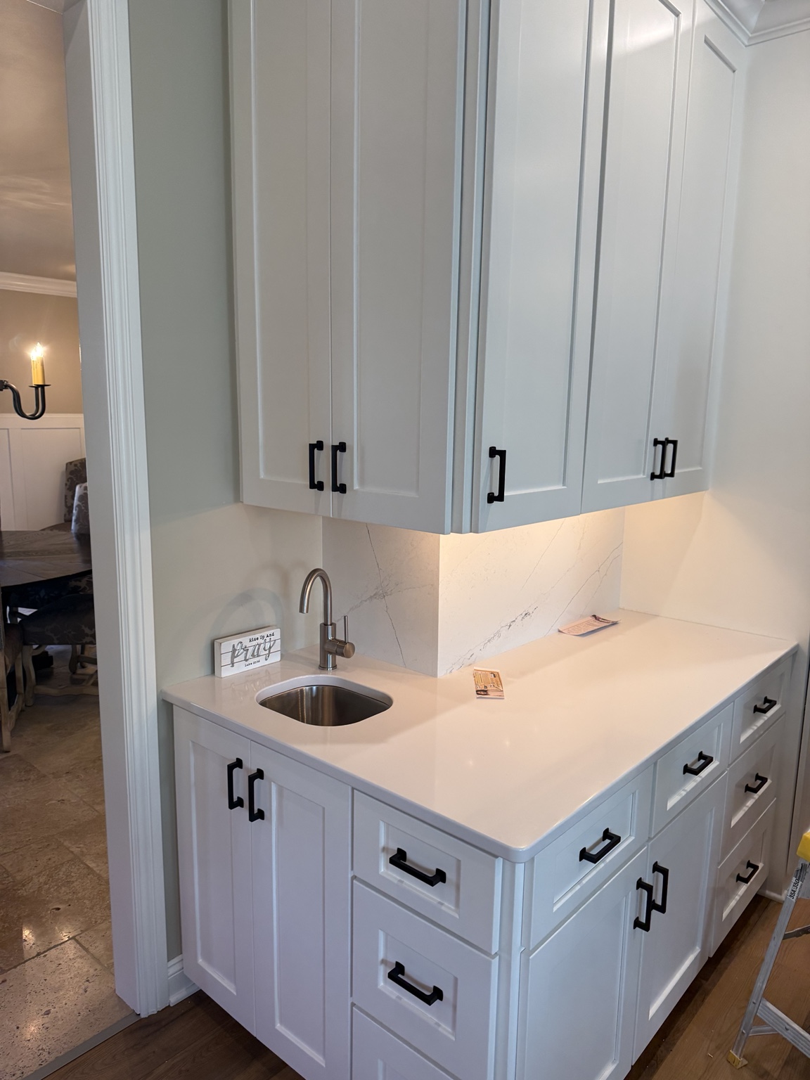 White kitchen cabinets refinished by AJC Painting